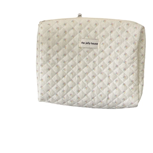 Floral cotton quilted makeup bag with purple flower pattern and zipper closure