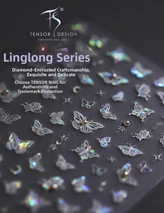 Macro detail of holographic butterfly nail stickers with pearlescent bead accents