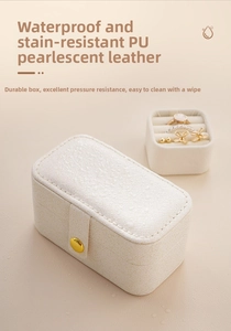 Waterproof white PU leather mini jewelry case with secure gold button closure