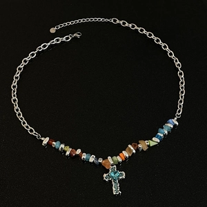 Blue cross necklace with colorful crushed stones and silver metal chain accessory