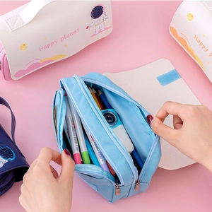 Blue astronaut pencil case with large capacity compartments and stationery storage