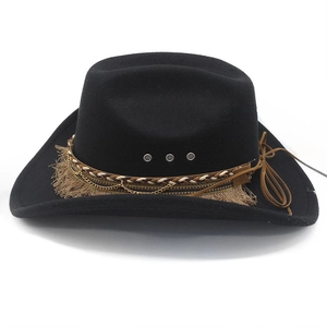 Detail of black cowboy hat with ethnic style tassels, gold chains and braided bands