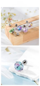 Macro shot of multi-color zircon ear studs with 4-claw stainless steel screw-back design