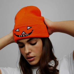 Orange Halloween knit beanie with embroidered pumpkin smile face for autumn and winter
