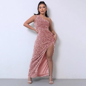 Detail of pink sequin evening gown showing the high slit and shimmering fabric texture