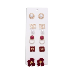 Lot de dix boucles d'oreilles vintage avec fleurs en velours rouge, perles et clous dorés