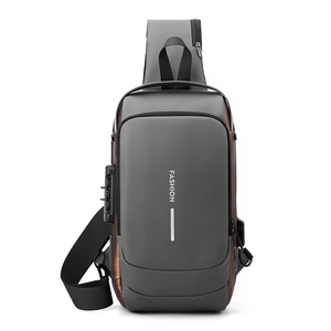 Detail view of anti-theft combination lock and USB charging port on water-resistant chest bag