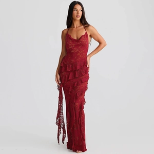 Detail of red lace dress showing layered ruffle hem and mermaid style fishtail design
