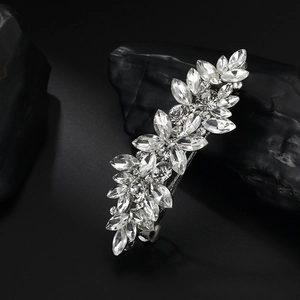 Sparkling marquise crystal spring hair clip with elegant floral pattern on dark stone
