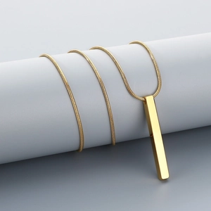 Polished 18K gold plated stainless steel rectangular pendant wrapped around a cylinder