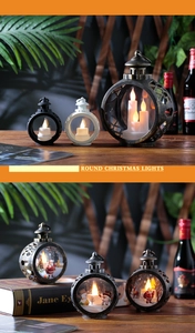 Detailed view of round Christmas lantern featuring Santa illustration and LED candle glow