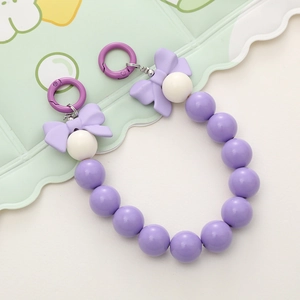 Lilac candy-colored acrylic phone chain with beads, purple bow, and dual carabiners