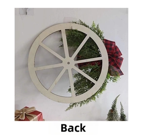 Detail view of the back of a rustic pinecone wreath with buffalo plaid bow and wood wheel