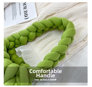 Detailed macro view of the grass green chunky knit texture of the handmade bag material