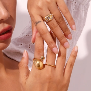18K gold plated stainless steel teardrop rings set with micro-inlaid pave diamonds