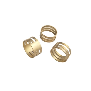Three gold tiered hollow rings for DIY jewelry making and beadwork finger protection