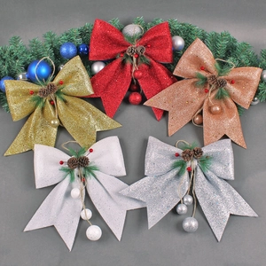 Christmas bow ornaments set with pine cones and berries in five glittery colors