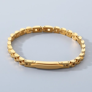 Macro view of gold stainless steel watchband link bracelet with folding safety clasp