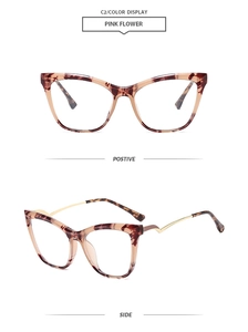Detail of pink flower cat eye glasses frame with metallic gold temples in side view