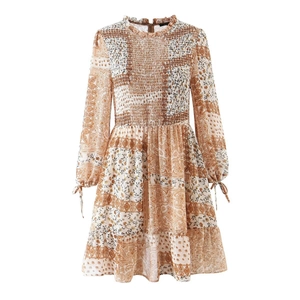 Brown floral and paisley print dress with smocked chest and lantern tie sleeves