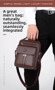 Macro detail of dark brown pebble leather briefcase showing fine texture and hardware