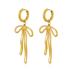 Detailed close-up of gold bow earrings with mirror polish finish and elegant flowing metal style