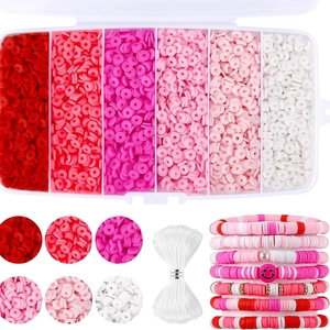 Pink and red DIY clay heishi bead kit with elastic string and smiley face beads for jewelry