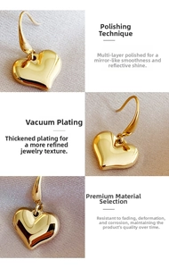 Detail of 14k gold plated heart earrings showing vacuum plating and mirror polishing