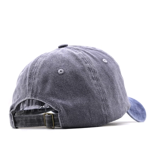 Detail of adjustable metal buckle and washed cotton texture on the back of baseball cap