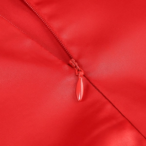 Detail shot of the seamless red invisible zipper on high-quality twill evening dress fabric