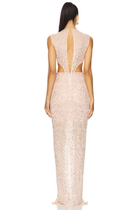 Vue détaillée du dos d'une robe longue à paillettes avec découpe à la taille et finitions
