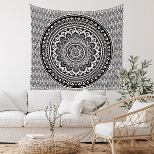 Detailed close-up showing black and white mandala wall tapestry in a modern living room decor