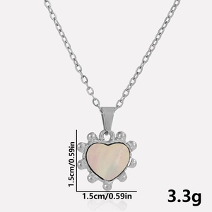 Detail showing heart-shaped 304 stainless steel pendant with white shell inlay dimensions