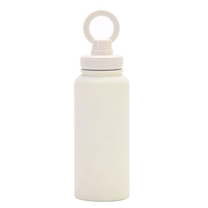 Macro detail of white insulated water bottle with portable circular handle and matte finish