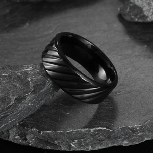 Minimalist black textured titanium steel ring for men with spiral grooved pattern