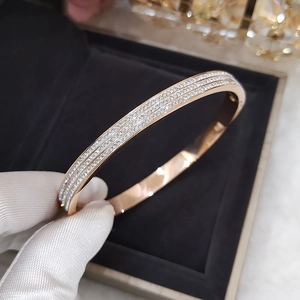 Luxurious rose gold titanium steel bracelet with three rows of micro-paved diamonds