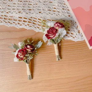 Handmade dried flower boutonniere set with red roses and lace ribbon for wedding events