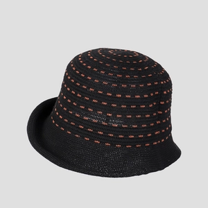 Close-up of black linen knit bucket hat with orange dashed texture and rolled brim detail