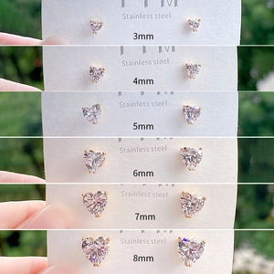Minimalist heart-shaped stud earrings in sizes 3mm to 8mm with gold-plated stainless steel