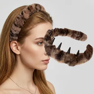 Detail view of leopard print plush headband with inner teeth for secure styling