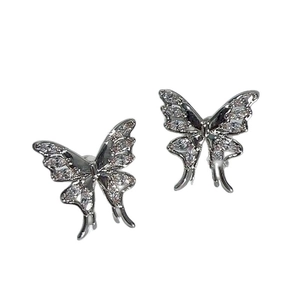 Elegant silver butterfly ear cuffs with sparkling zircon crystals in a minimalist style