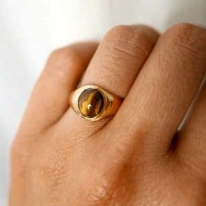 Retro 18k gold-plated stainless steel signet ring with oval tiger eye stone on hand