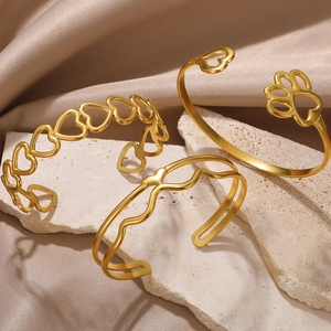 Three-piece gold hollow heart and wave pattern open bangles for women in stainless steel