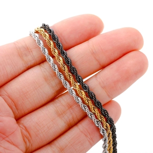 Macro shot of 3mm twist rope chains in silver, gold, and black stainless steel finishes