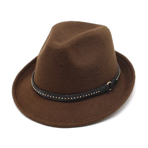 Detail of coffee brown wool fedora hat featuring black leather band and metal studs
