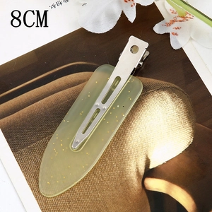 Detail shot of 8cm gradient acetate hair clip with gold glitter and metal back flat clip