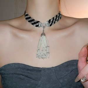 Detailed view of luxury choker featuring zircon chain and multi-layer pearl tassels
