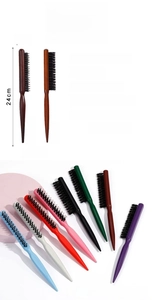 Detail view of professional 3-row styling brush with natural boar bristles and nylon pins