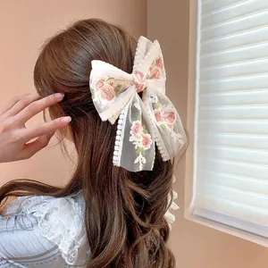 Elegant large white lace bow hair clip with pink floral embroidery for women