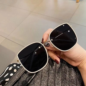 Chic oversized square sunglasses with cream frame, black lenses, and golden bridge